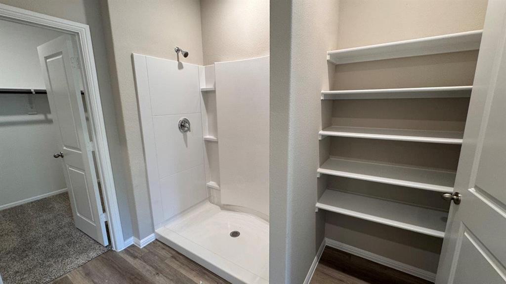 325 Wildrose Circle Cleburne, TX 76033 - Photo 8 of 24 a bathroom with a tub and shower