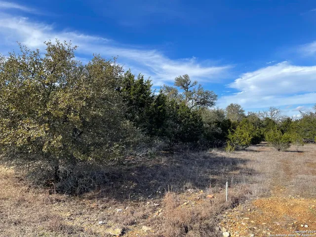 a view of a yard covered with snow