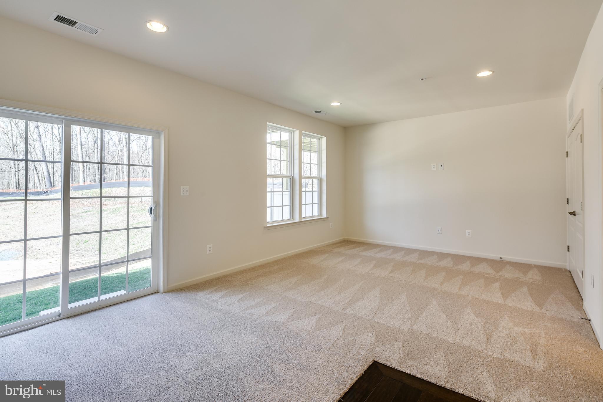904 Morgan Run Road Baltimore, MD 21220 - Photo 2 of 23 a view of an empty room with a window