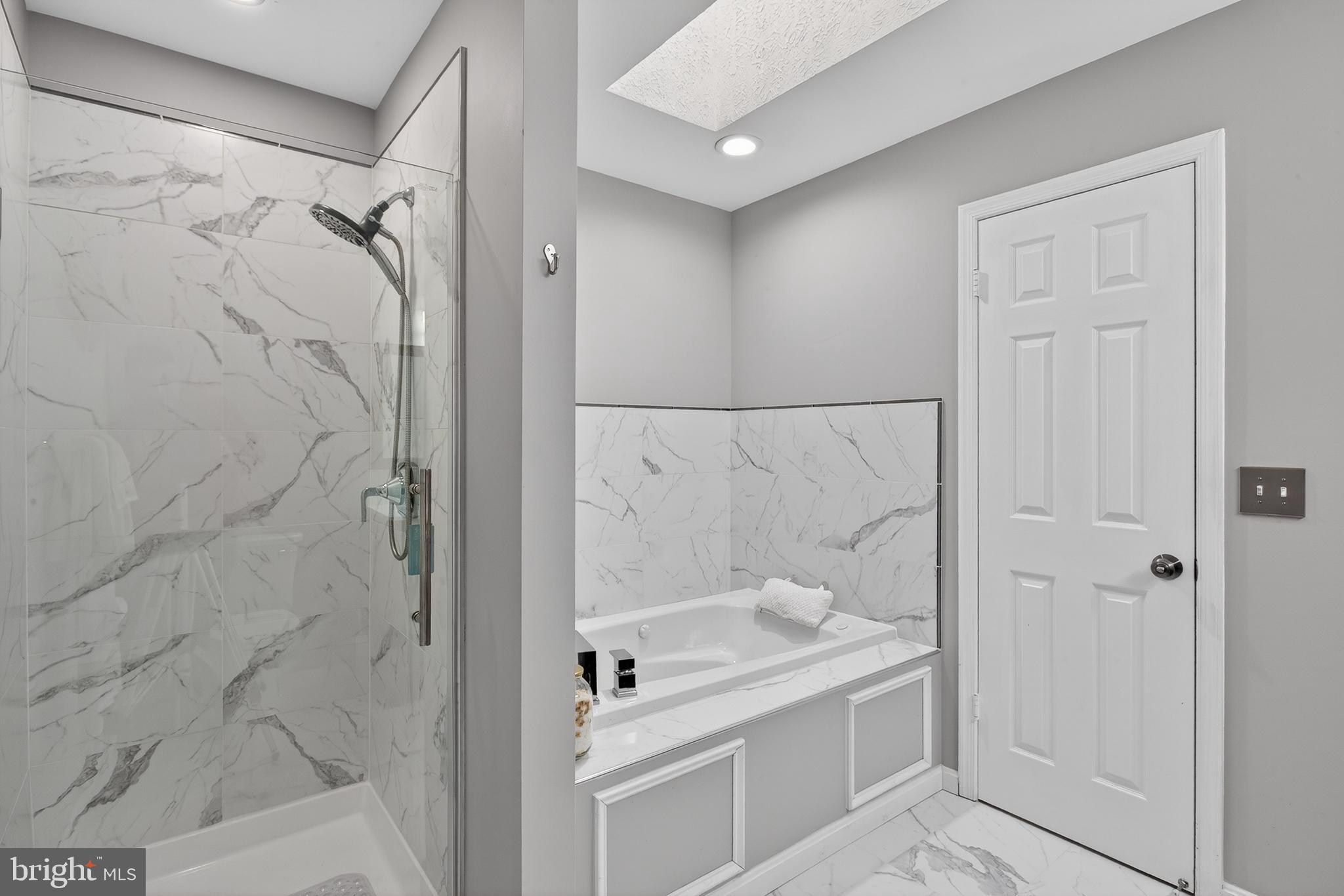 9311 Hobart Street Bowie, MD 20721 - Photo 19 of 27 Soaking tub and separate shower