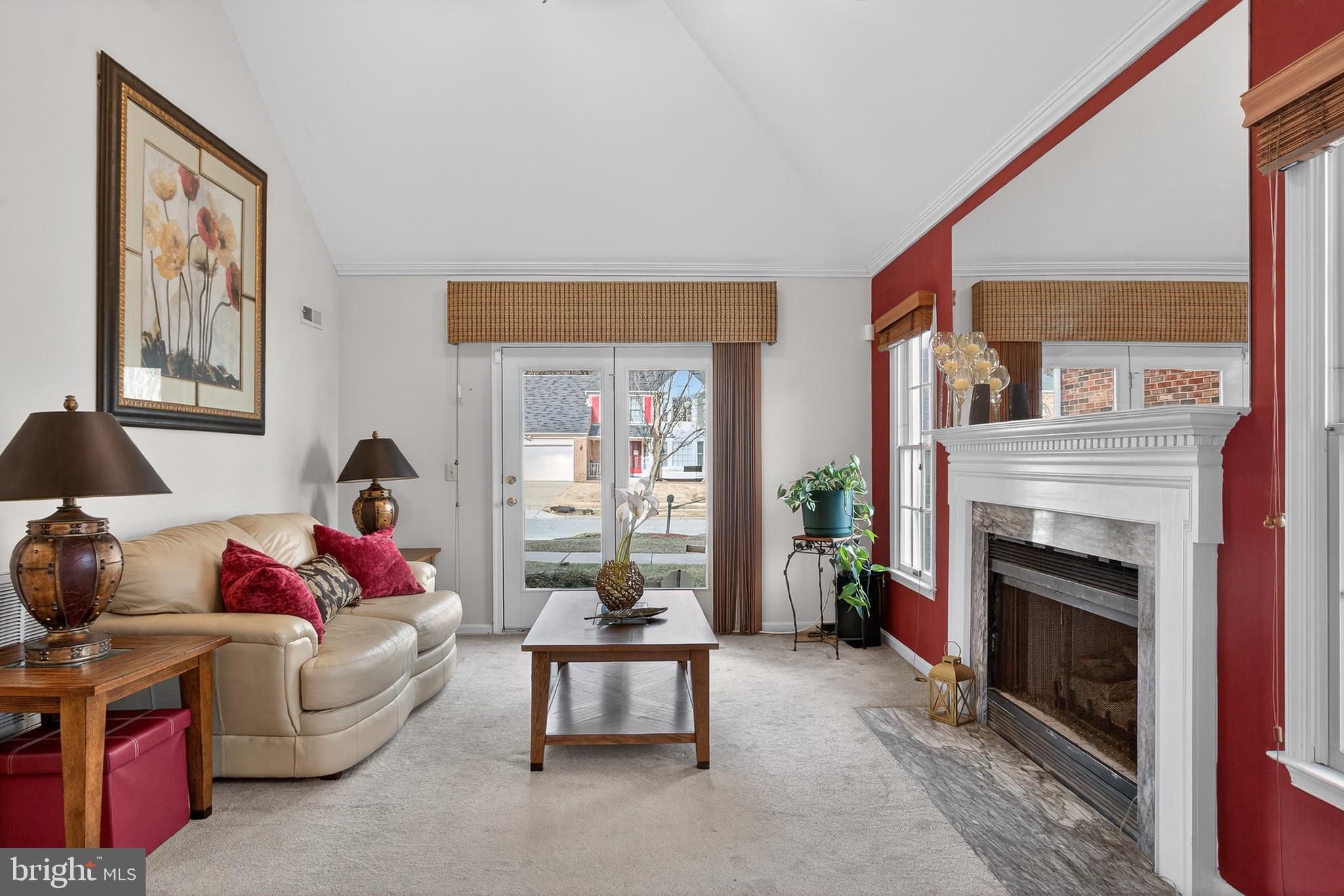 9311 Hobart Street Bowie, MD 20721 - Photo 5 of 27 Family Room with Gas Fireplace and vaulted ceiling
