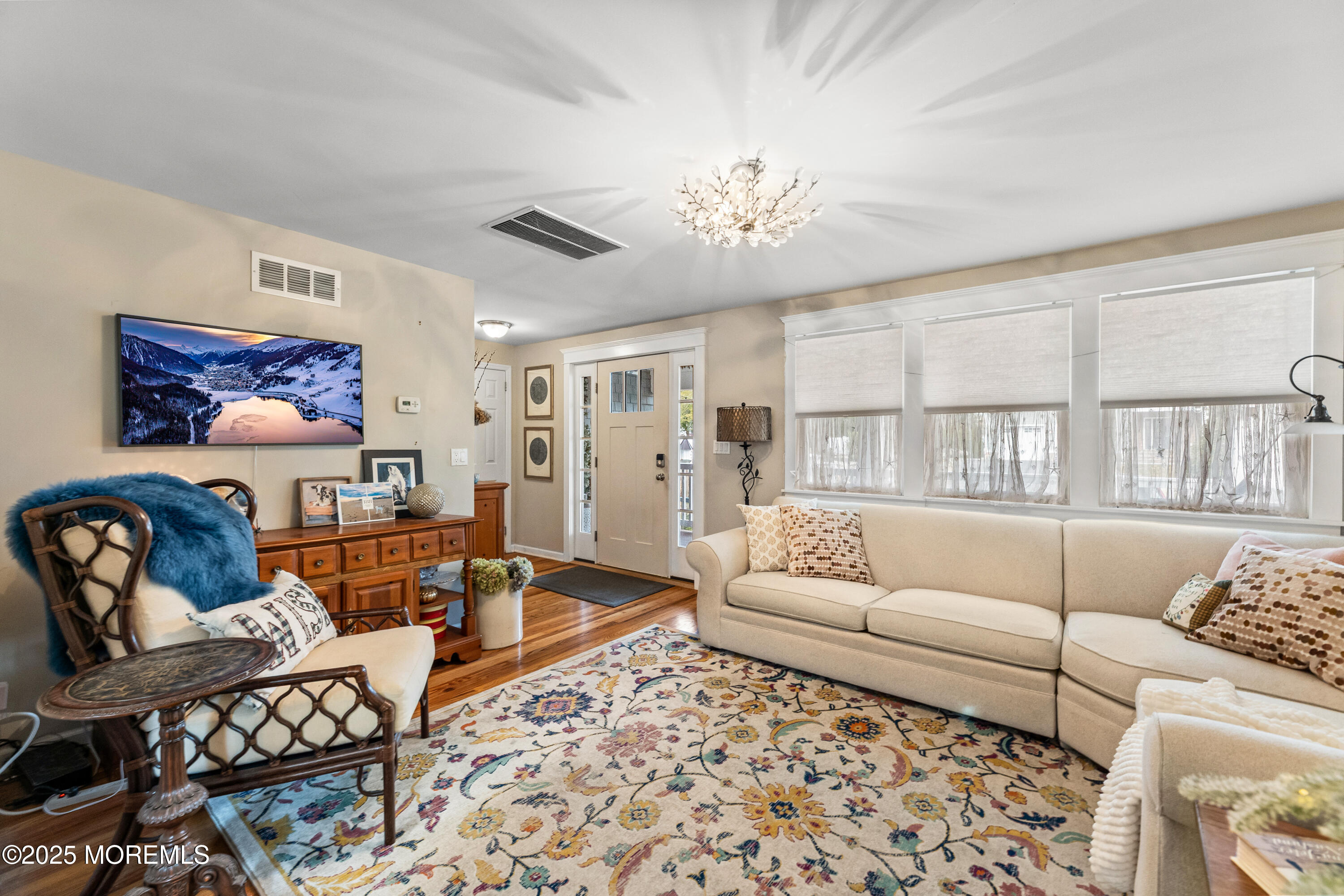 1609 Wight Street Wall, NJ 07719 - Photo 14 of 39 a living room with furniture a couch and wooden floor