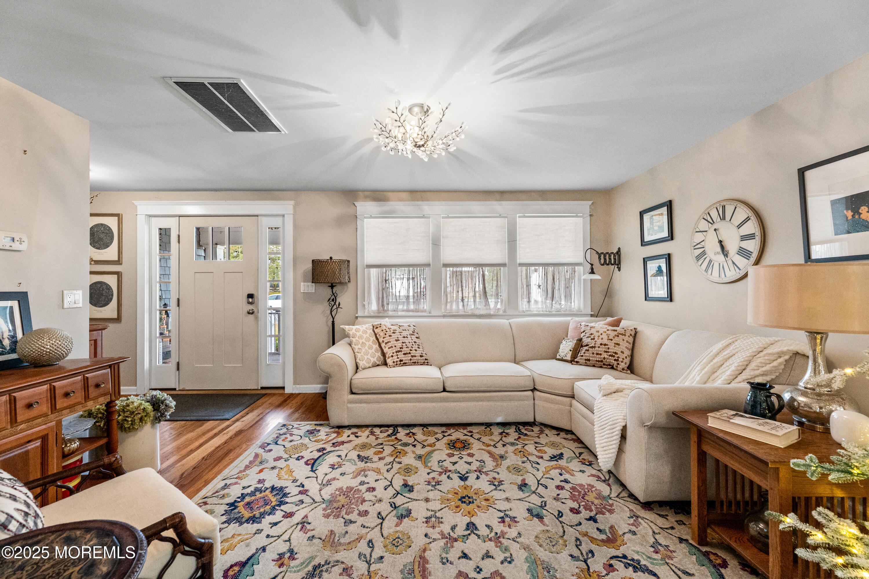 1609 Wight Street Wall, NJ 07719 - Photo 15 of 39 a living room with furniture a rug and a window
