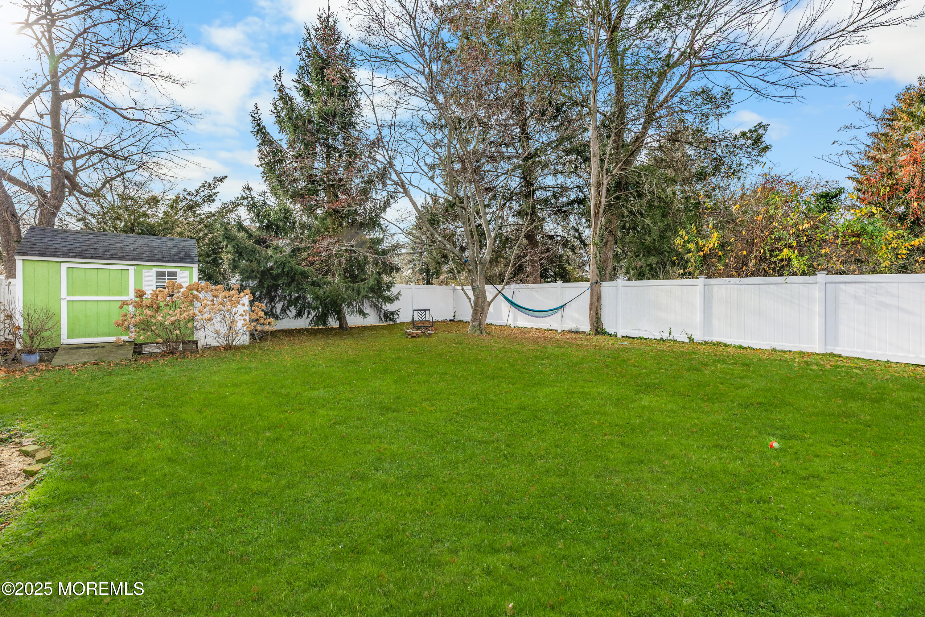 1609 Wight Street Wall, NJ 07719 - Photo 31 of 39 a view of a backyard with a garden