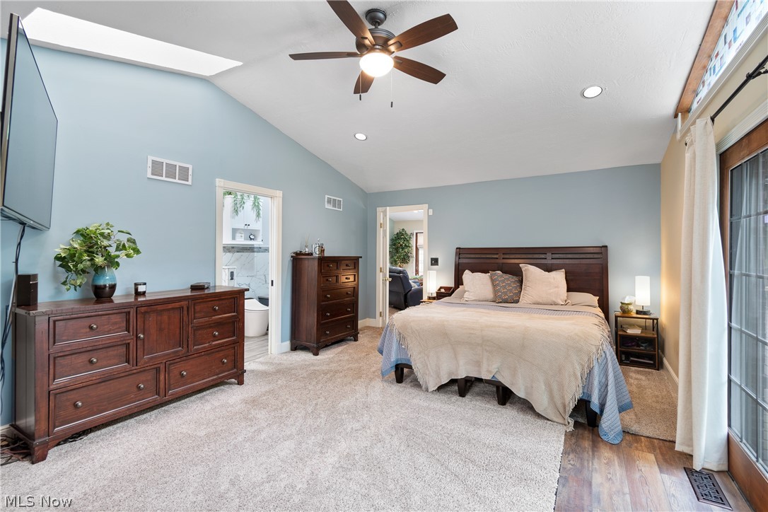 443 Merriman Road Akron, OH 44303 - Photo 20 of 44 Vaulted ceiling bedroom featuring a ceiling fan, recessed lighting, and a skylight