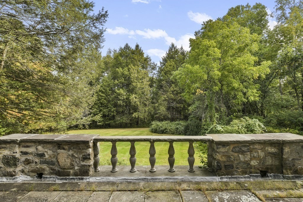 25 Plympton Road Sudbury, MA 01776 - Photo 9 of 19 a view of swimming pool with outdoor seating and green space