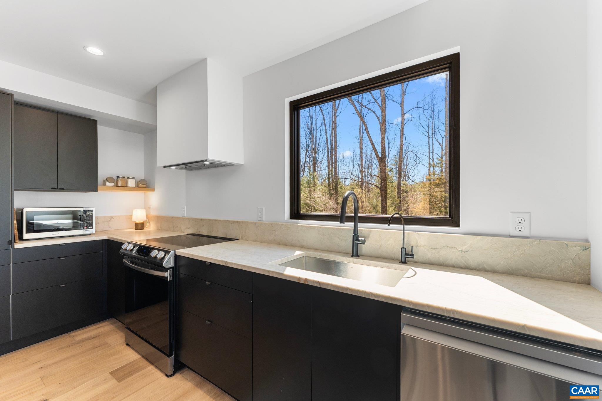 6500 Free Union Road Free Union, VA 22940 - Photo 7 of 35 a kitchen with a sink and a window