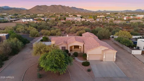 an aerial view of house with an outdoor space