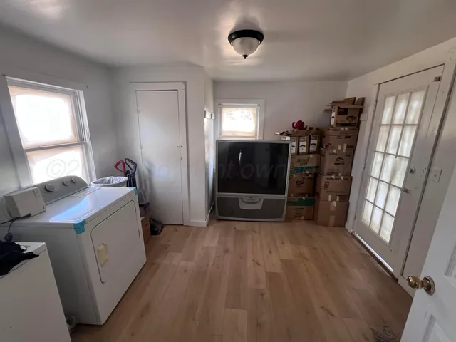 a room with furniture and a fireplace