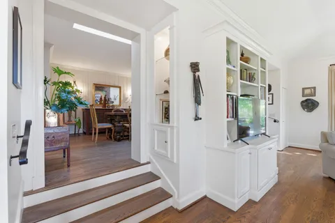 a view of a livingroom with furniture and windows