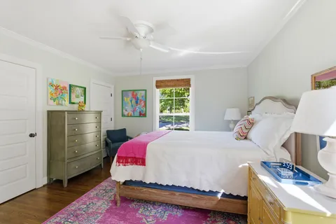 a bedroom with a bed and furniture