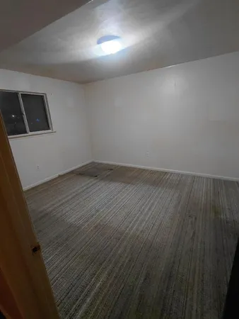 a view of hallway with a small space