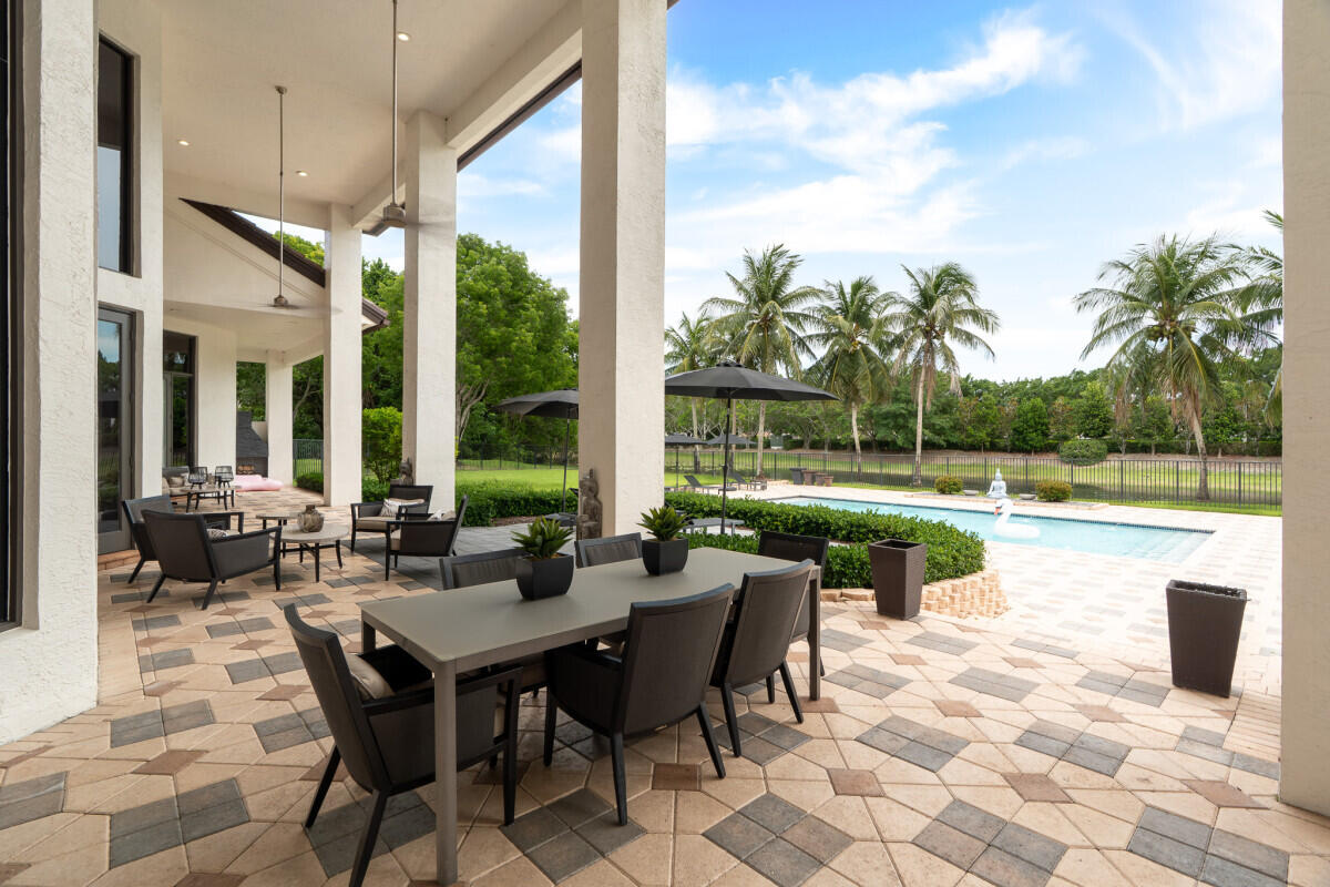 3500 Windmill Ranch Road Weston, FL 33331 - Photo 21 of 47 a view of outdoor space yard swimming pool and patio