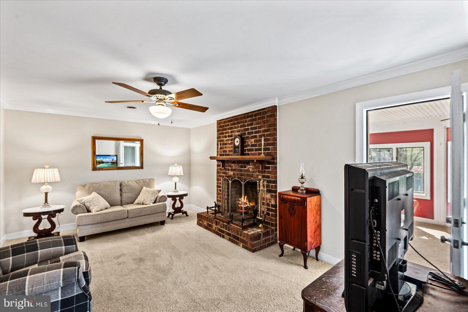 16211 Parrish Farm Road Montpelier, VA 23192 - Photo 17 of 52 Cozy family room with a warm fireplace.