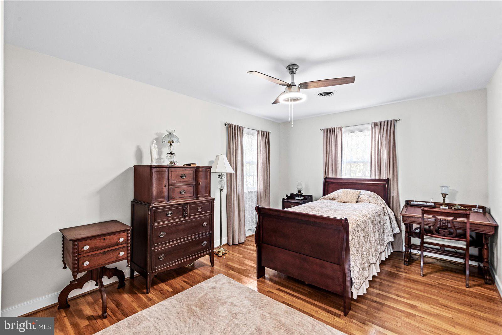 16211 Parrish Farm Road Montpelier, VA 23192 - Photo 28 of 52 Serene bedroom with warm wooden tones.