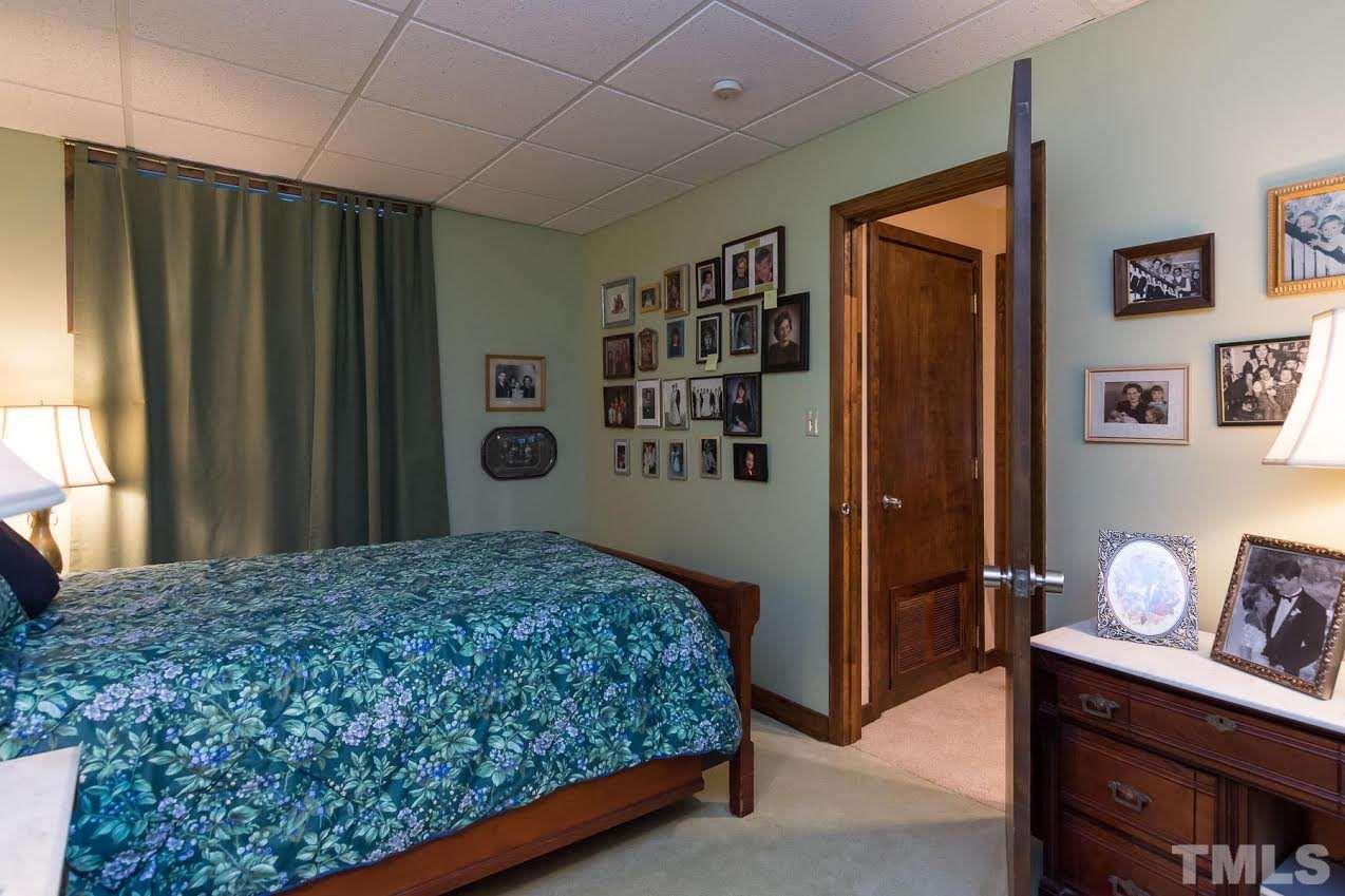 1500 Southview Road Durham, NC 27703 - Photo 16 of 22 a bedroom with a bed and a window