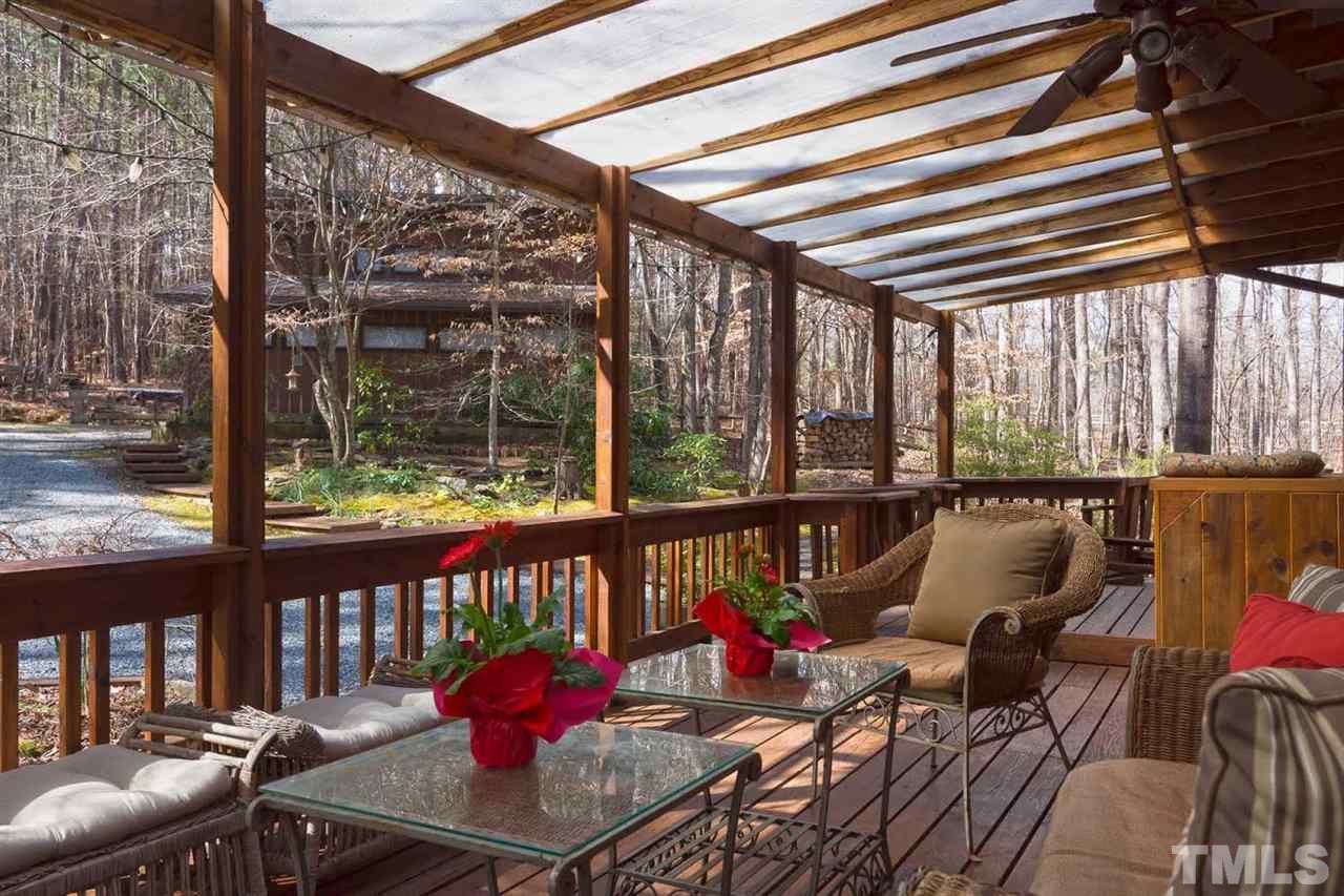 1500 Southview Road Durham, NC 27703 - Photo 3 of 22 a balcony with furniture and a potted plant