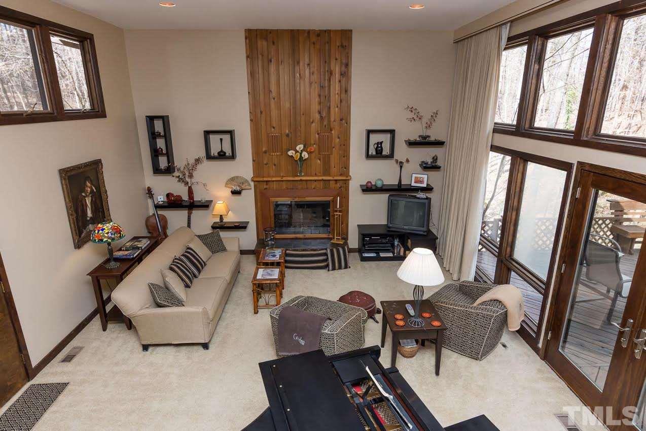 1500 Southview Road Durham, NC 27703 - Photo 10 of 22 a living room with furniture and a fireplace
