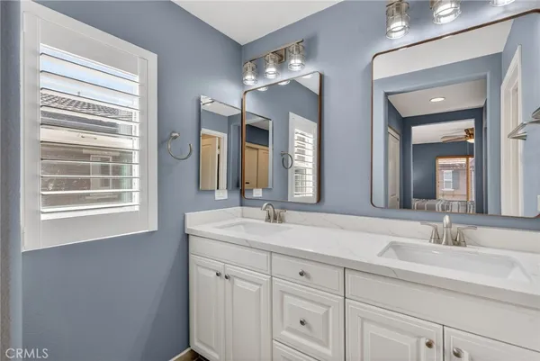 a bathroom with a shower and toilet