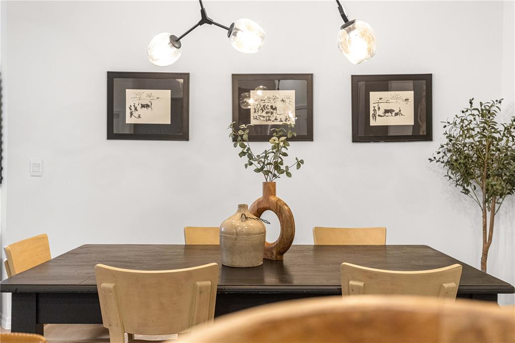 5377 Northwest 46th Lane Road Ocala, FL 34482 - Photo 23 of 59 a vase of flowers sitting on a table