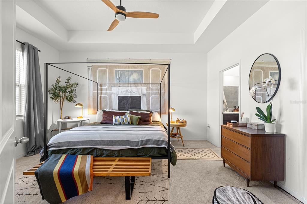 5377 Northwest 46th Lane Road Ocala, FL 34482 - Photo 24 of 59 a living room with furniture a rug potted plant and a window