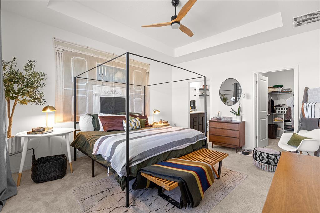 5377 Northwest 46th Lane Road Ocala, FL 34482 - Photo 31 of 59 a bedroom with bed and a potted plant