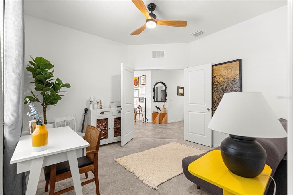 5377 Northwest 46th Lane Road Ocala, FL 34482 - Photo 37 of 59 a living room with furniture and a table