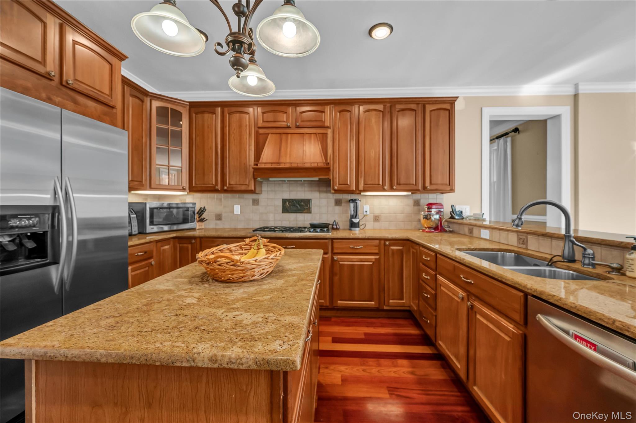 424 Gage Road Brewster, NY 10509 - Photo 11 of 42 a kitchen with stainless steel appliances granite countertop a sink window and cabinets