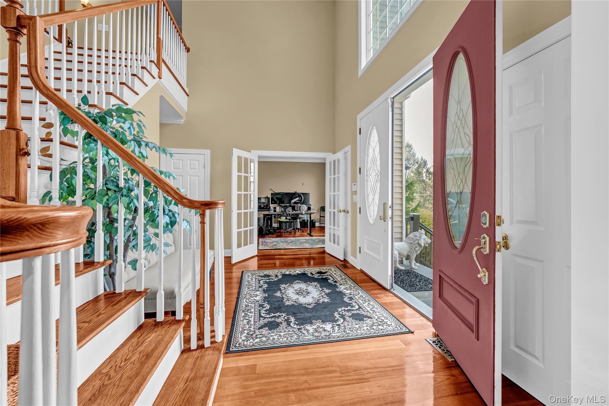 424 Gage Road Brewster, NY 10509 - Photo 2 of 42 a view of an entryway with wooden floor and stairs