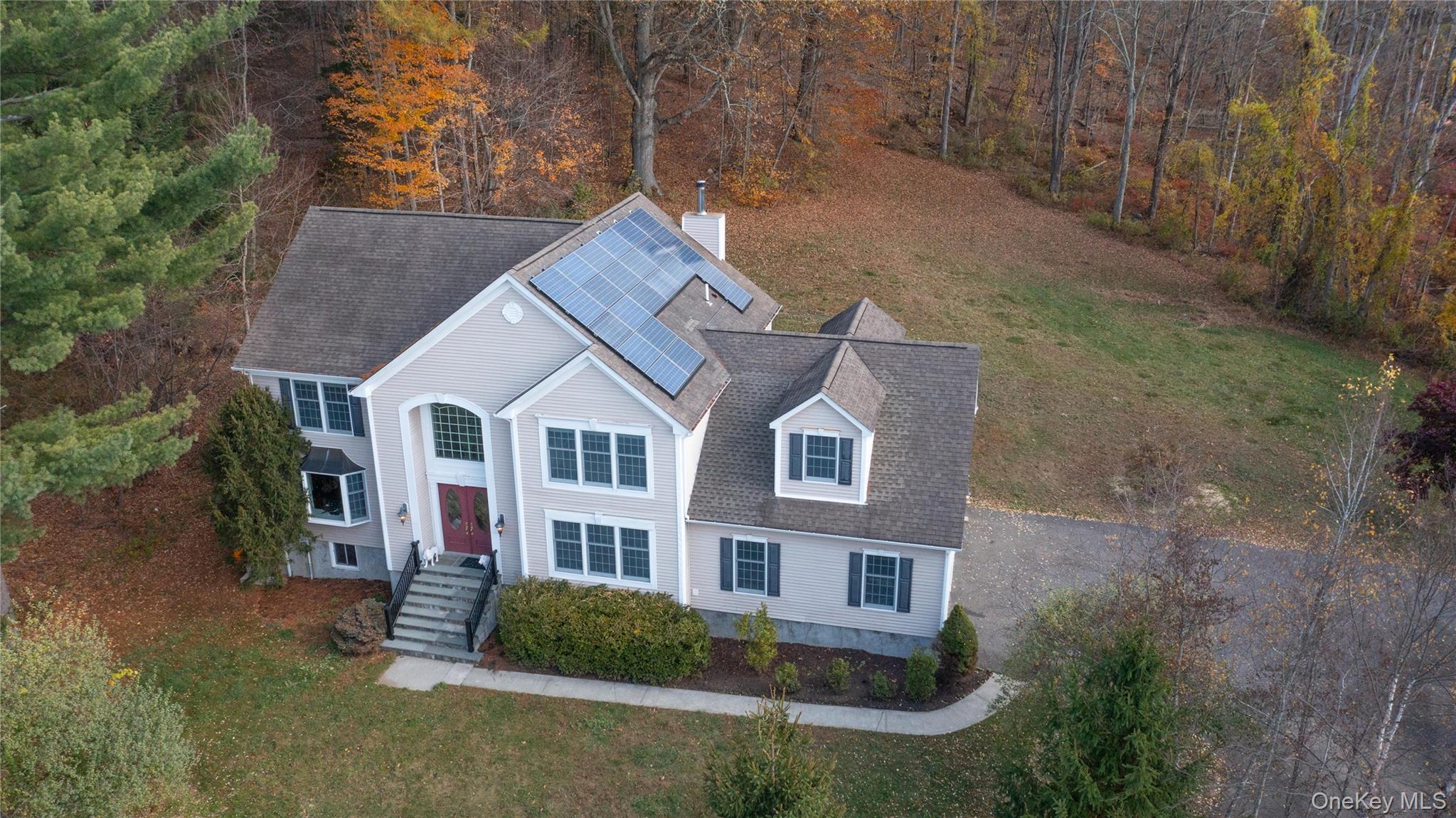 424 Gage Road Brewster, NY 10509 - Photo 39 of 42 a front view of a house with garden