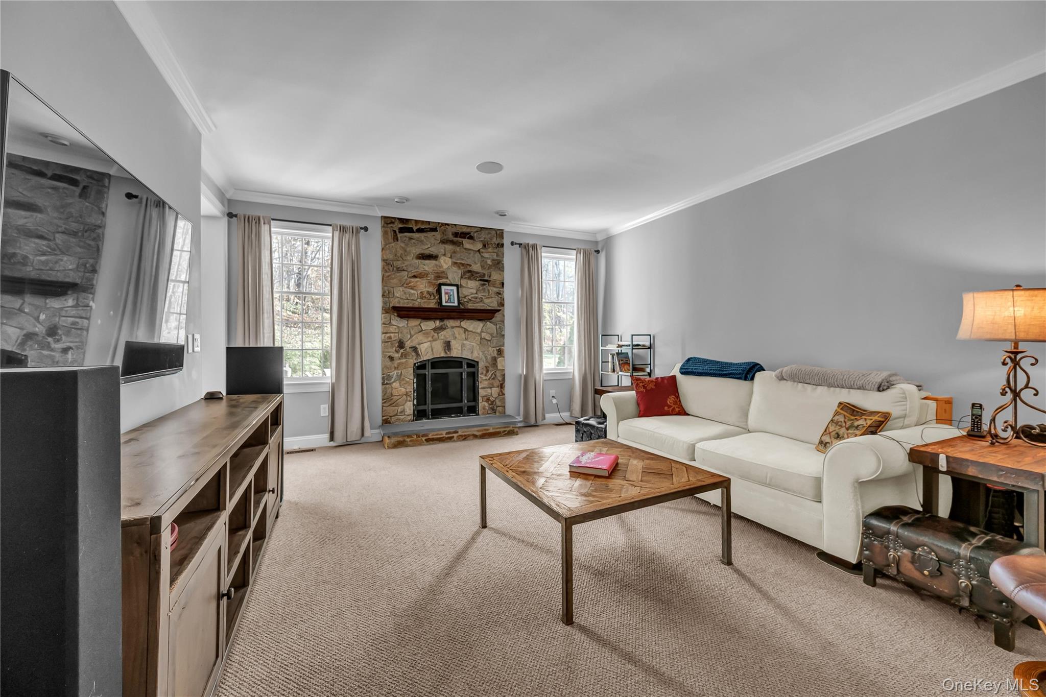 424 Gage Road Brewster, NY 10509 - Photo 8 of 42 a living room with furniture and a fireplace