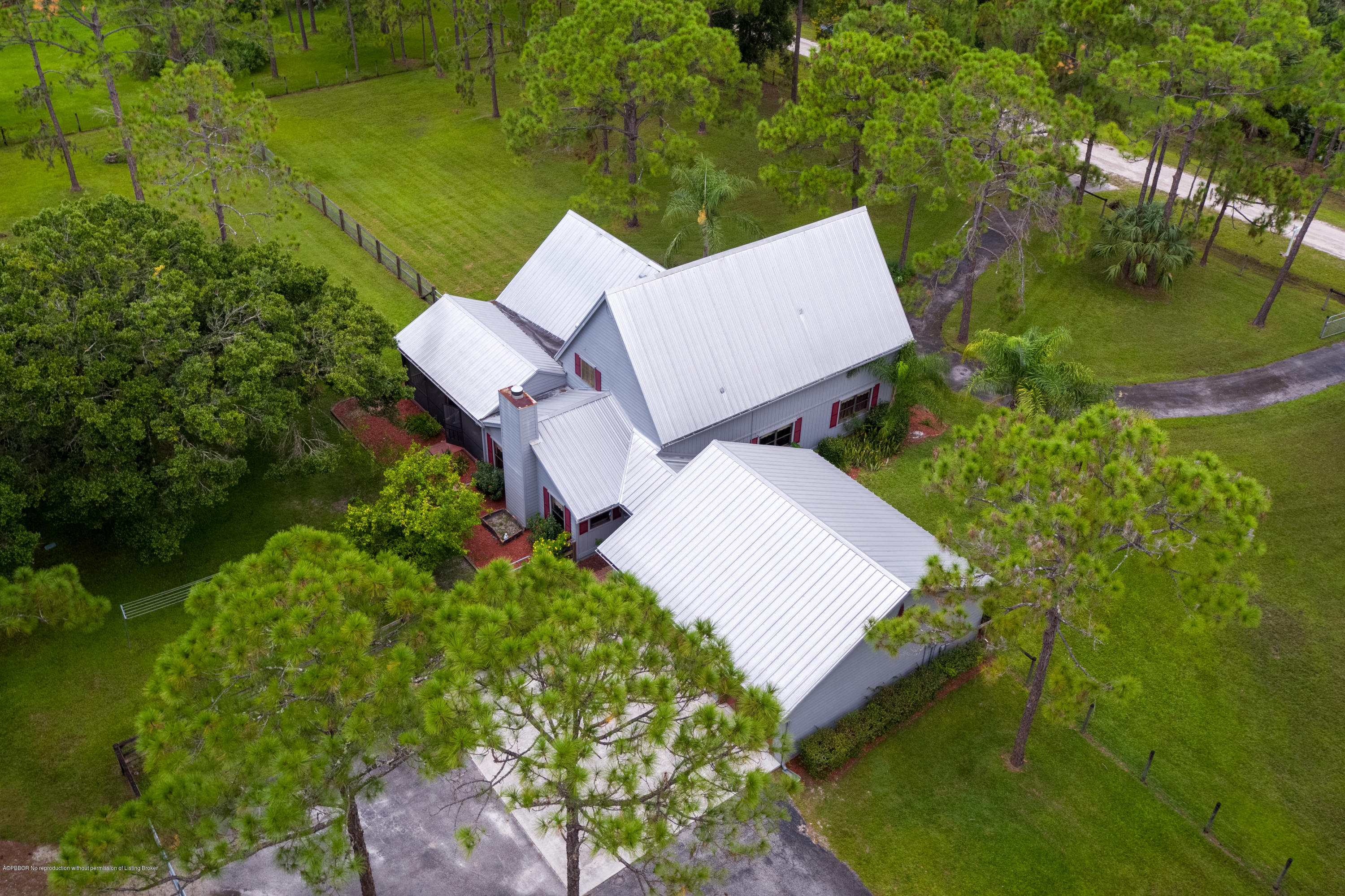 12142 157th Street North Jupiter, FL 33478 - Photo 12 of 49 an aerial view of a house with outdoor space and street view