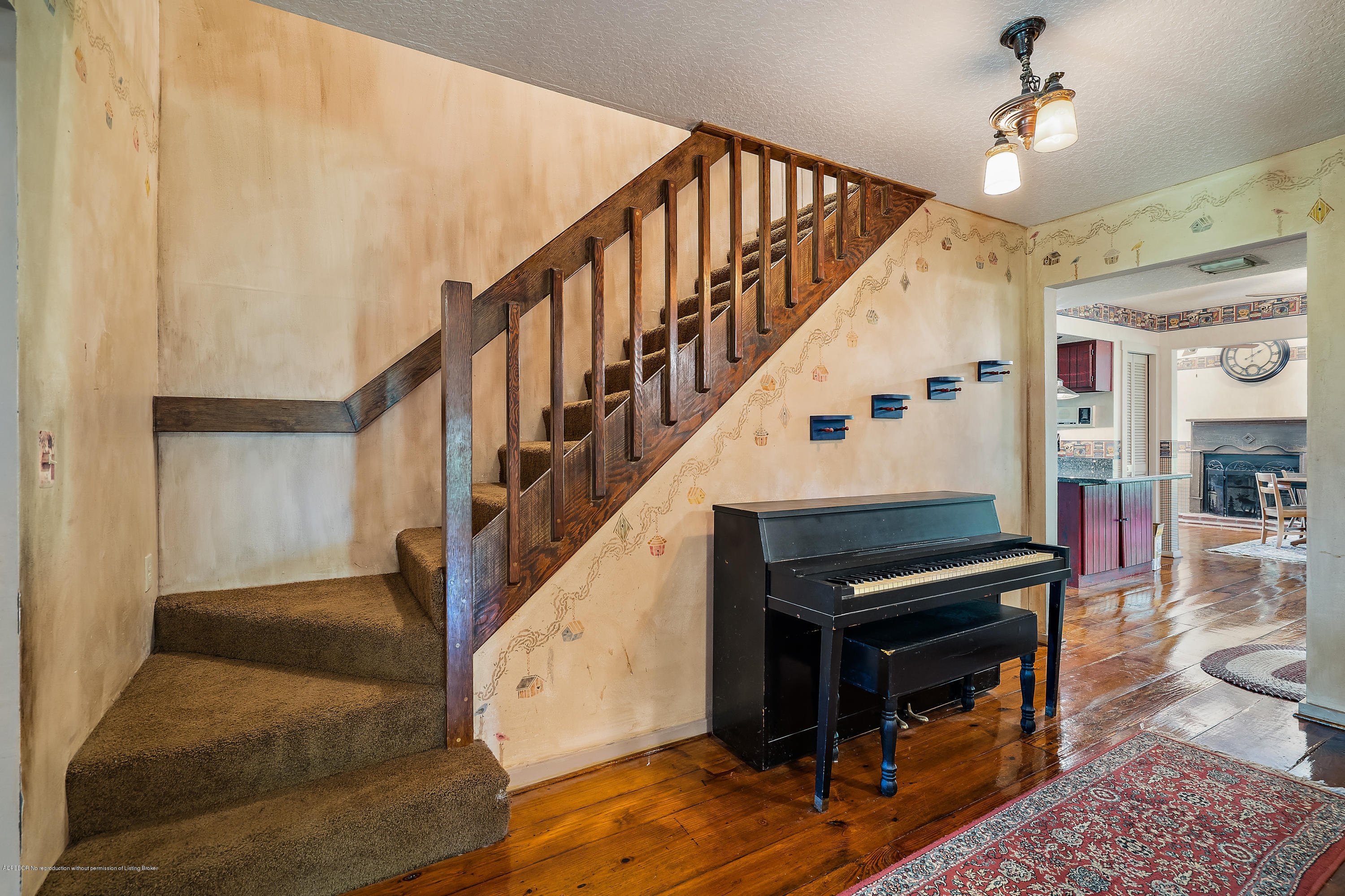 12142 157th Street North Jupiter, FL 33478 - Photo 29 of 49 a view of entryway and hall with wooden floor