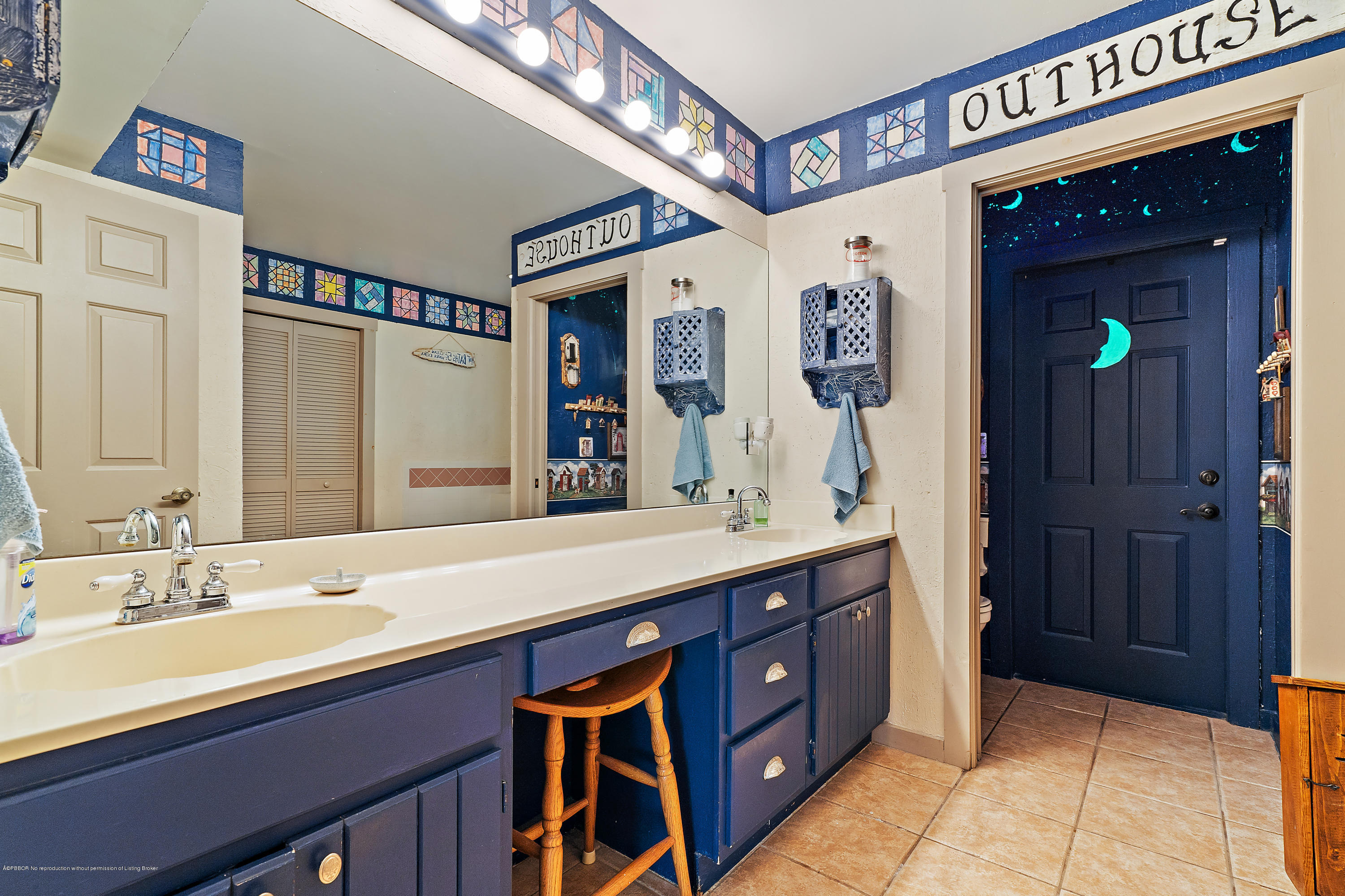 12142 157th Street North Jupiter, FL 33478 - Photo 32 of 49 a spacious bathroom with a sink double vanity and a mirror