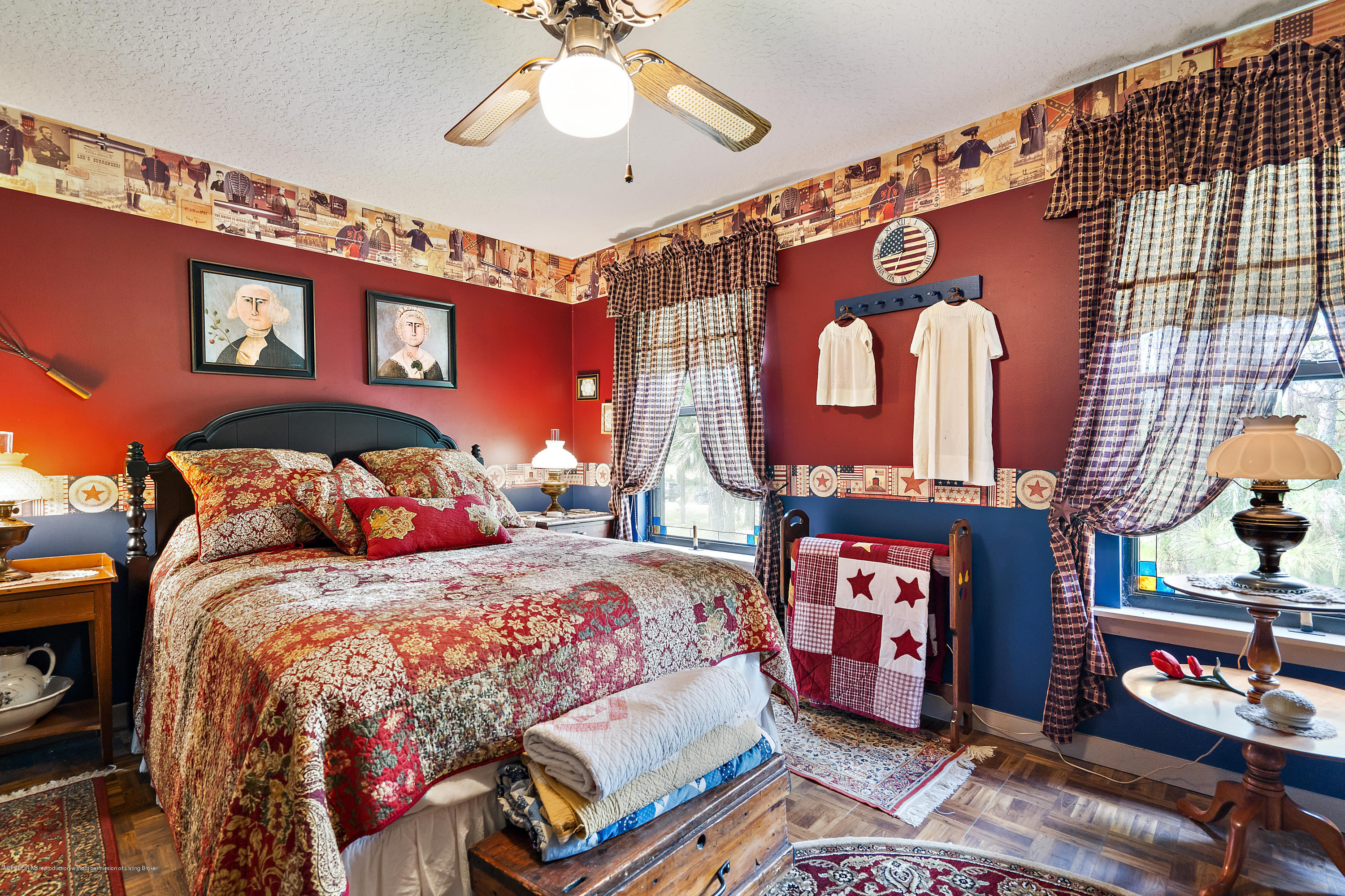 12142 157th Street North Jupiter, FL 33478 - Photo 42 of 49 a bedroom with double bed and a window