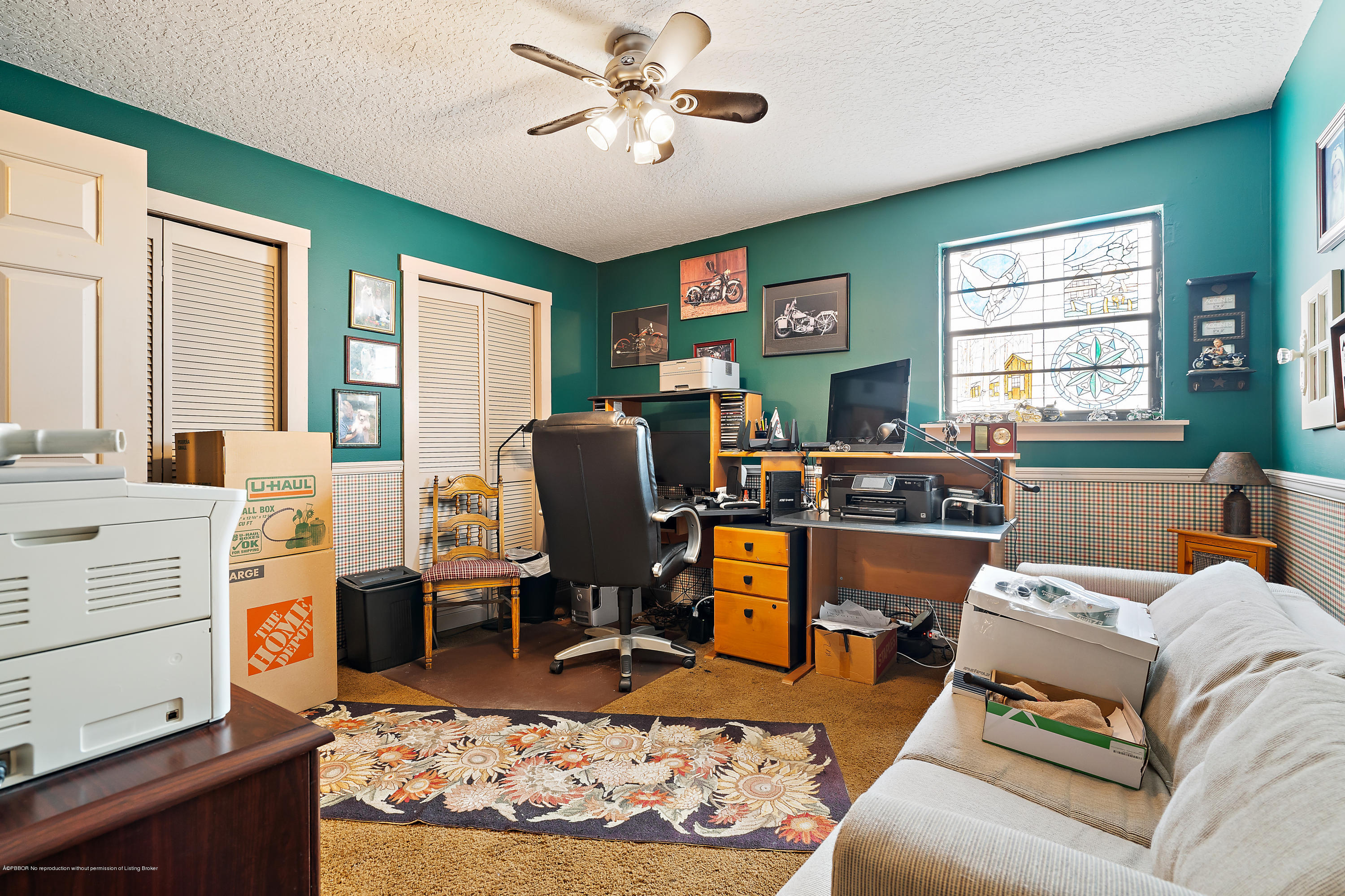 12142 157th Street North Jupiter, FL 33478 - Photo 45 of 49 a work room with furniture and a window
