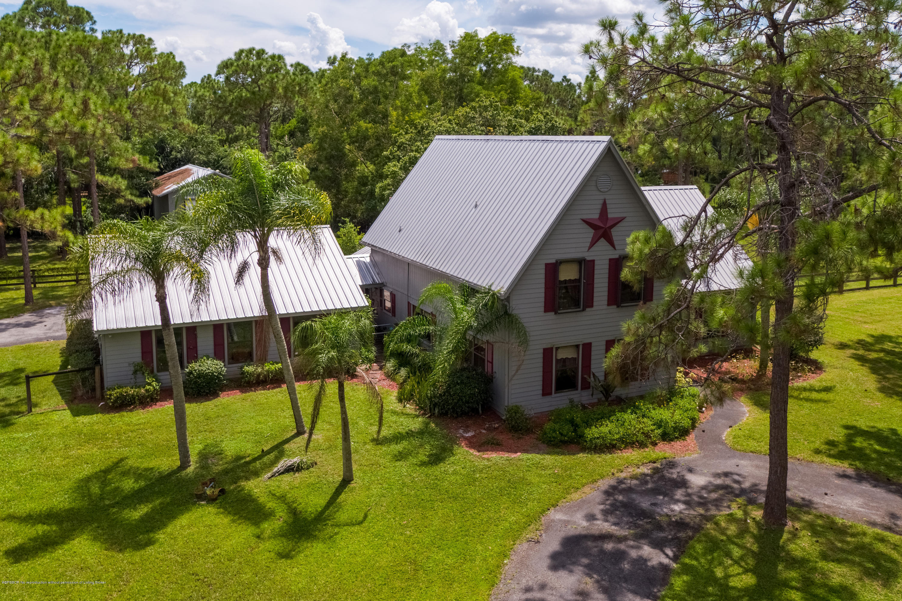 12142 157th Street North Jupiter, FL 33478 - Photo 9 of 49 a aerial view of a house