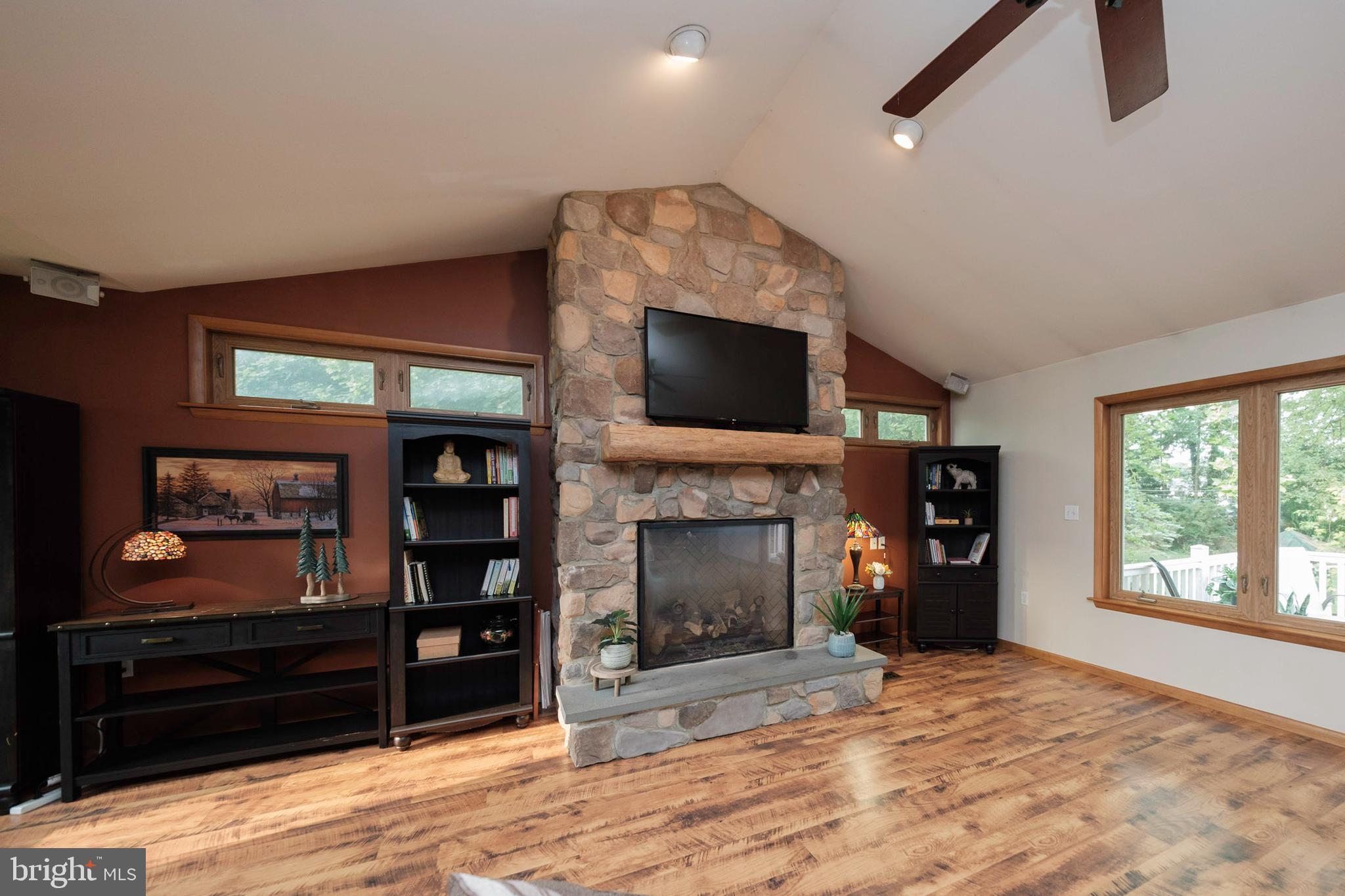 50 Rugby Road Birdsboro, PA 19508 - Photo 2 of 38 Stone wall to ceiling gas fireplace.