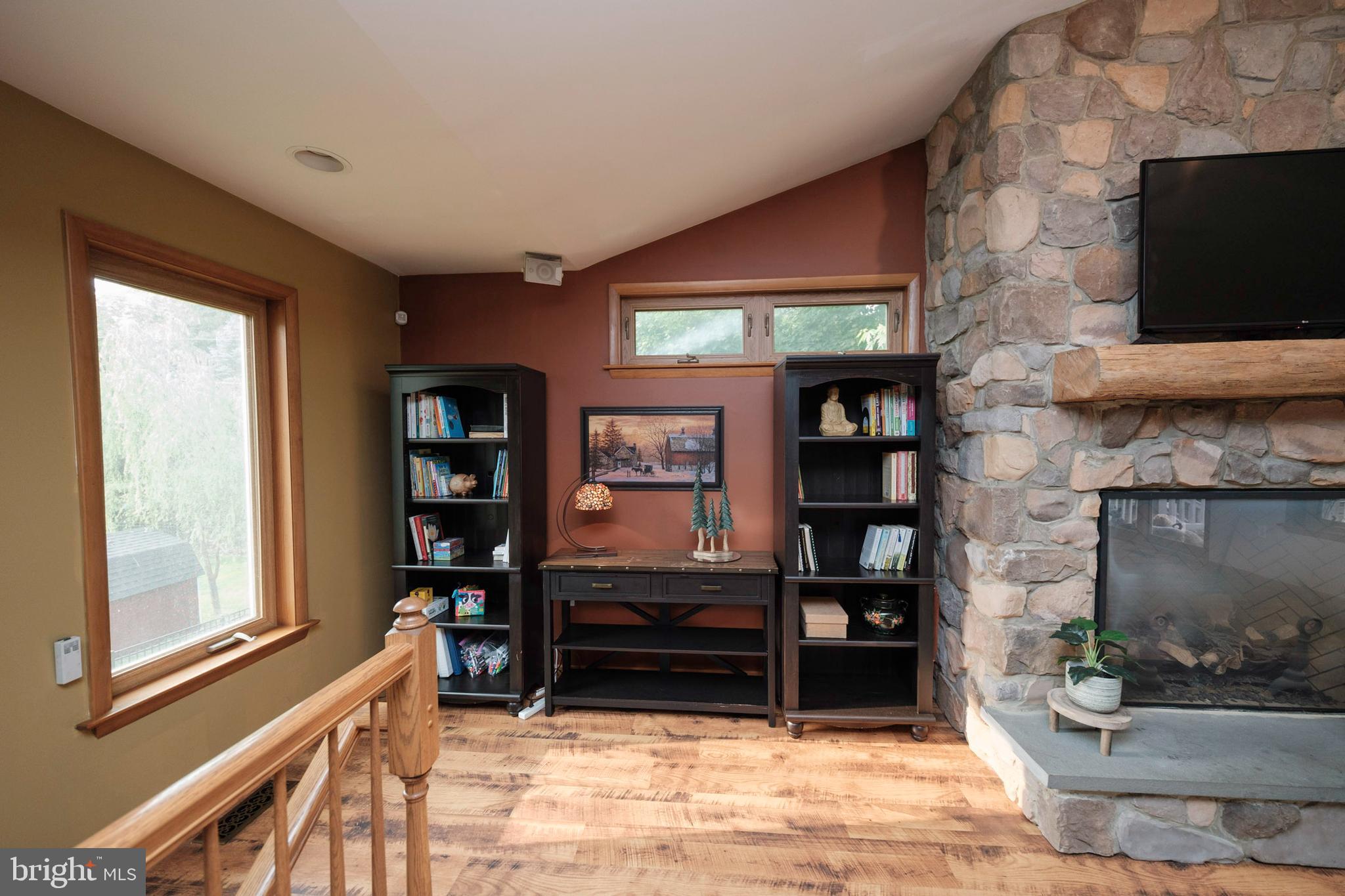 50 Rugby Road Birdsboro, PA 19508 - Photo 3 of 38 Family room with staircase going to lower level.