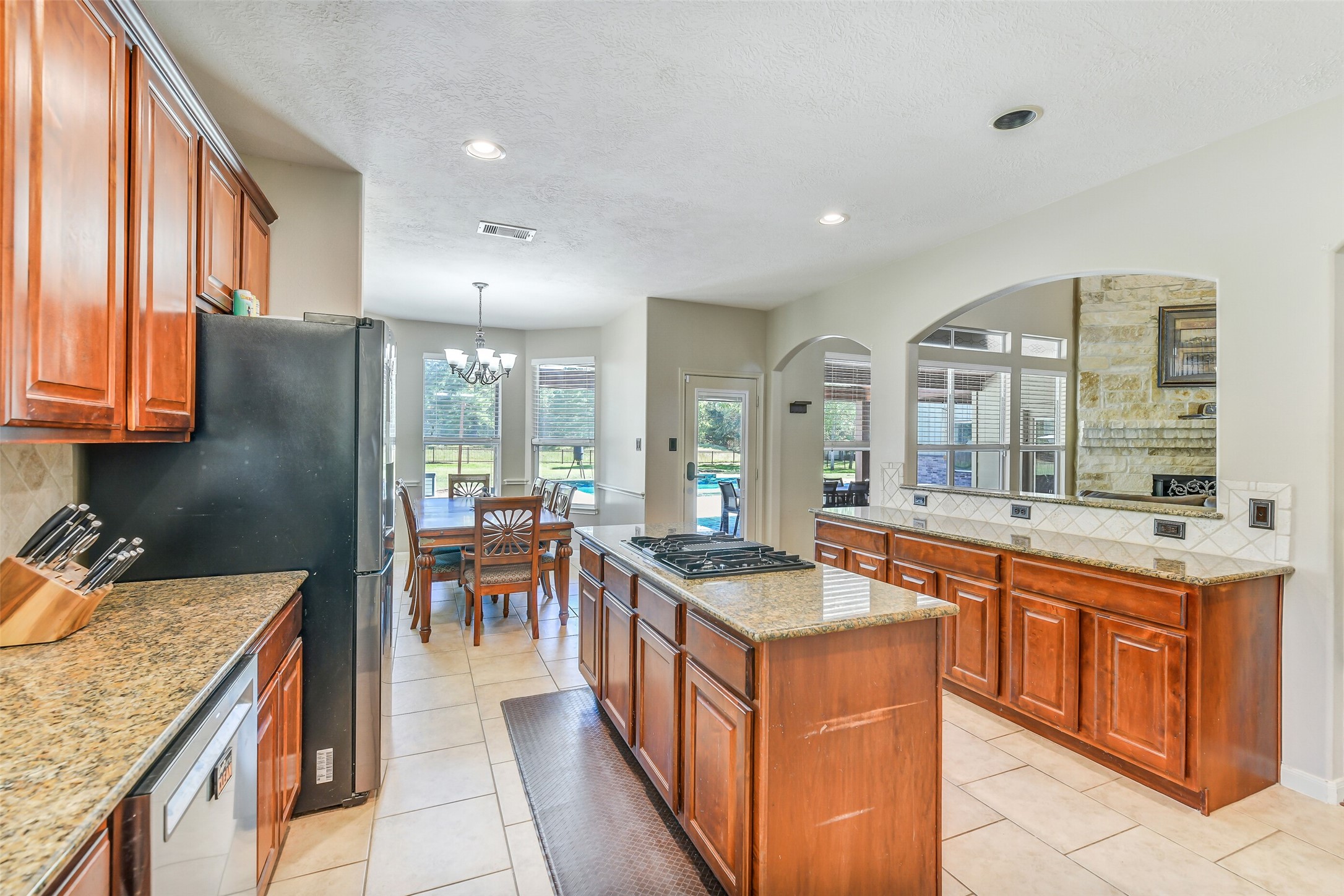 32711 Tall Oaks Way Magnolia, TX 77354 - Photo 11 of 50 a kitchen with stainless steel appliances granite countertop counter space and a sink