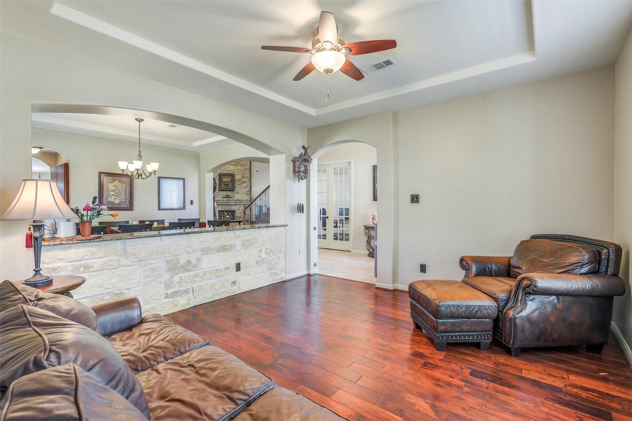32711 Tall Oaks Way Magnolia, TX 77354 - Photo 17 of 50 a living room with furniture and a wooden floor