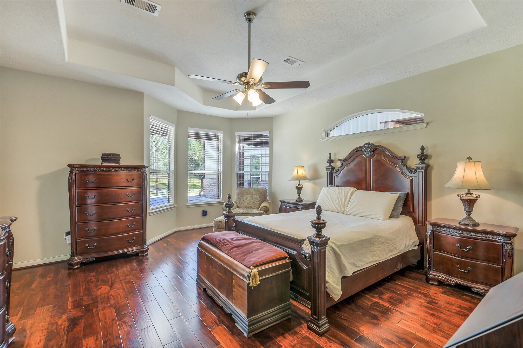 32711 Tall Oaks Way Magnolia, TX 77354 - Photo 21 of 50 a bedroom with a bed chandelier and a window