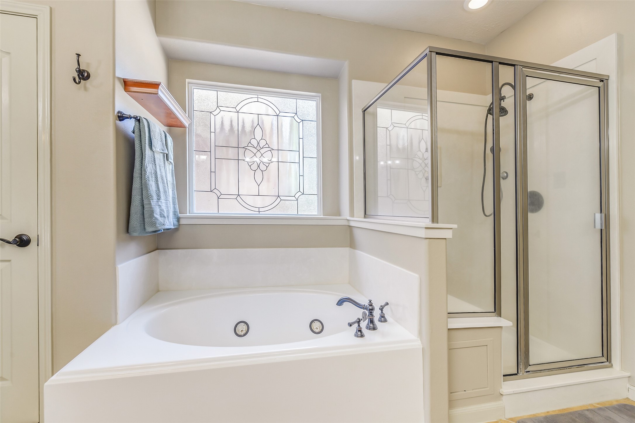 32711 Tall Oaks Way Magnolia, TX 77354 - Photo 25 of 50 a bathroom with a bathtub and a shower