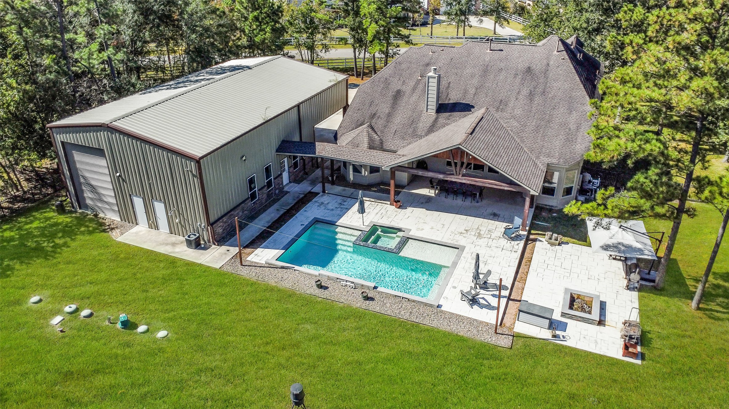 32711 Tall Oaks Way Magnolia, TX 77354 - Photo 3 of 50 an aerial view of a house having patio with a garden