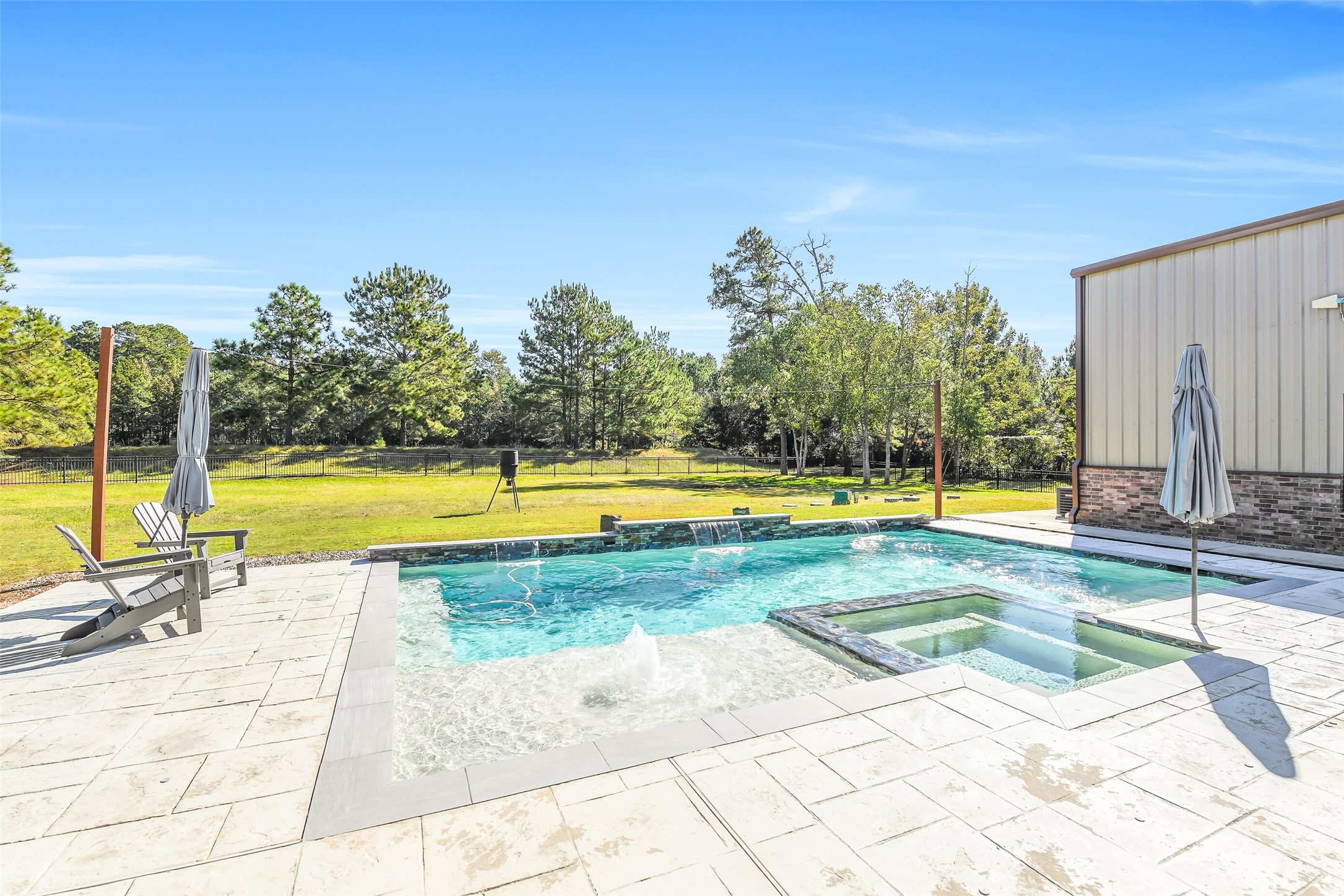 32711 Tall Oaks Way Magnolia, TX 77354 - Photo 36 of 50 a view of swimming pool with sitting area