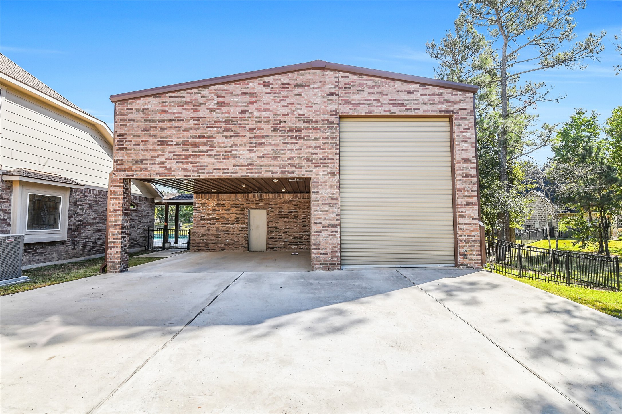 32711 Tall Oaks Way Magnolia, TX 77354 - Photo 40 of 50 a front view of a house with a garden