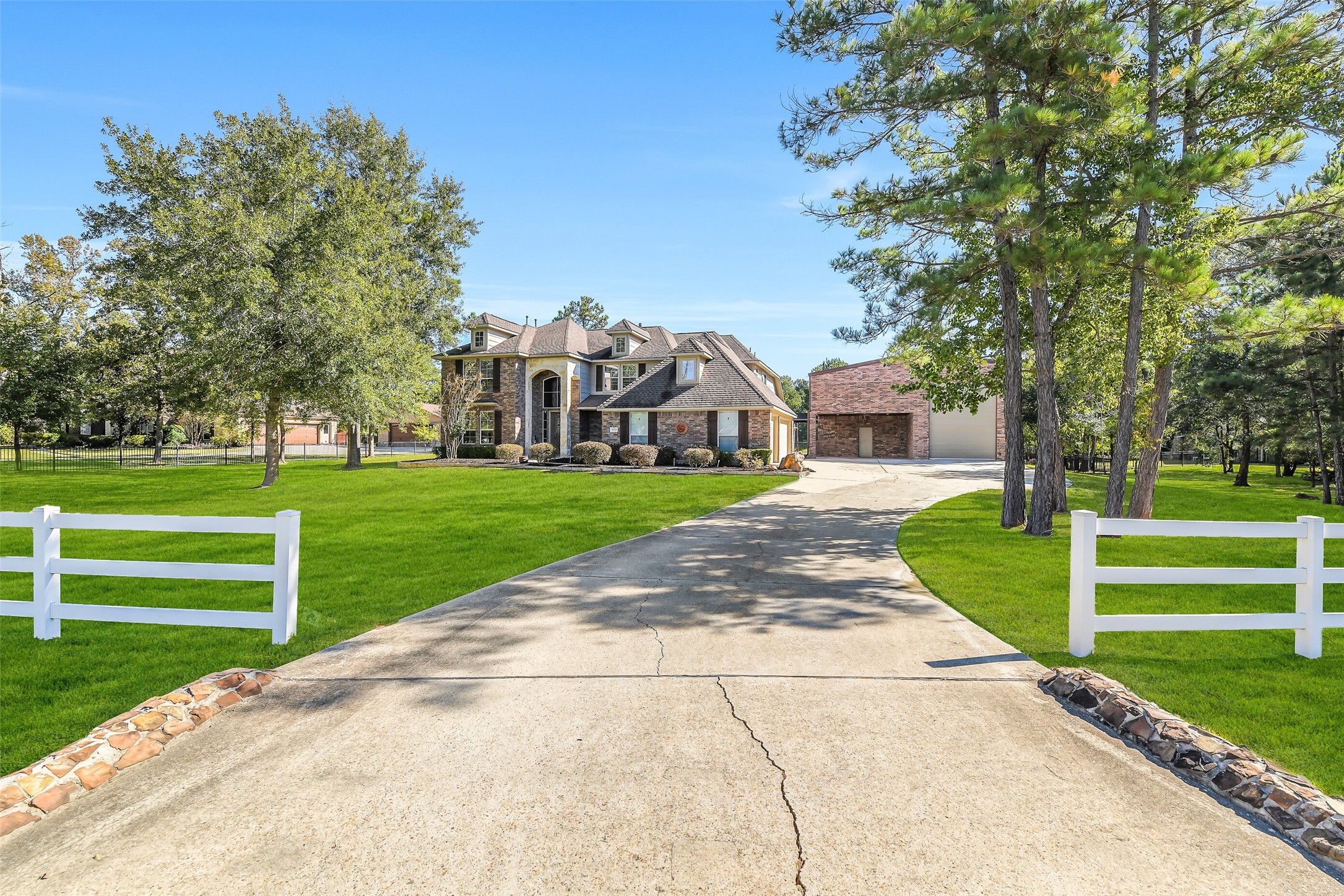 32711 Tall Oaks Way Magnolia, TX 77354 - Photo 4 of 50 a view of a house with a yard
