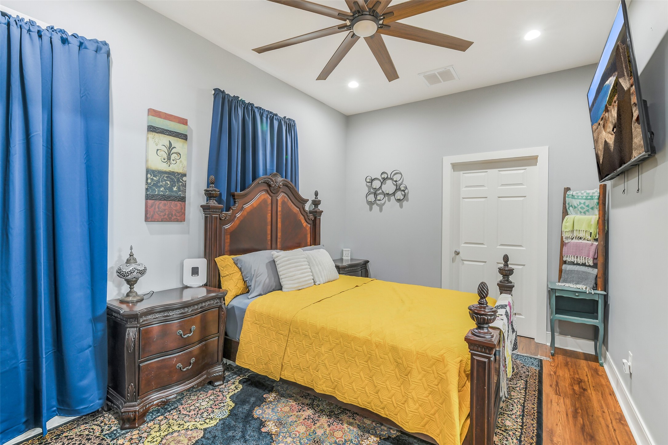 32711 Tall Oaks Way Magnolia, TX 77354 - Photo 43 of 50 a bedroom with a bed and a chandelier