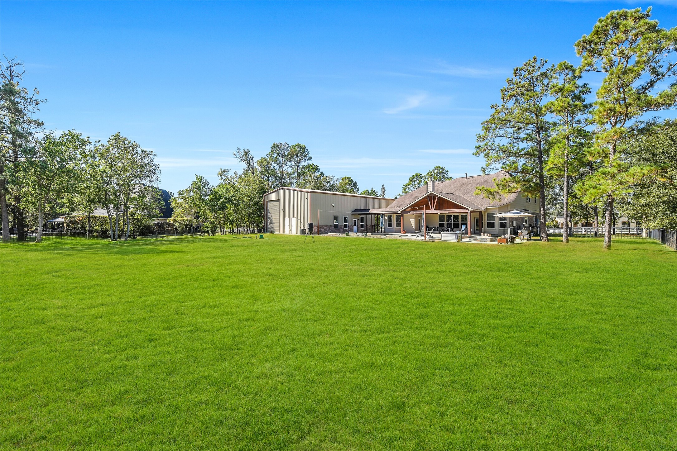 32711 Tall Oaks Way Magnolia, TX 77354 - Photo 45 of 50 a view of a house with a big yard
