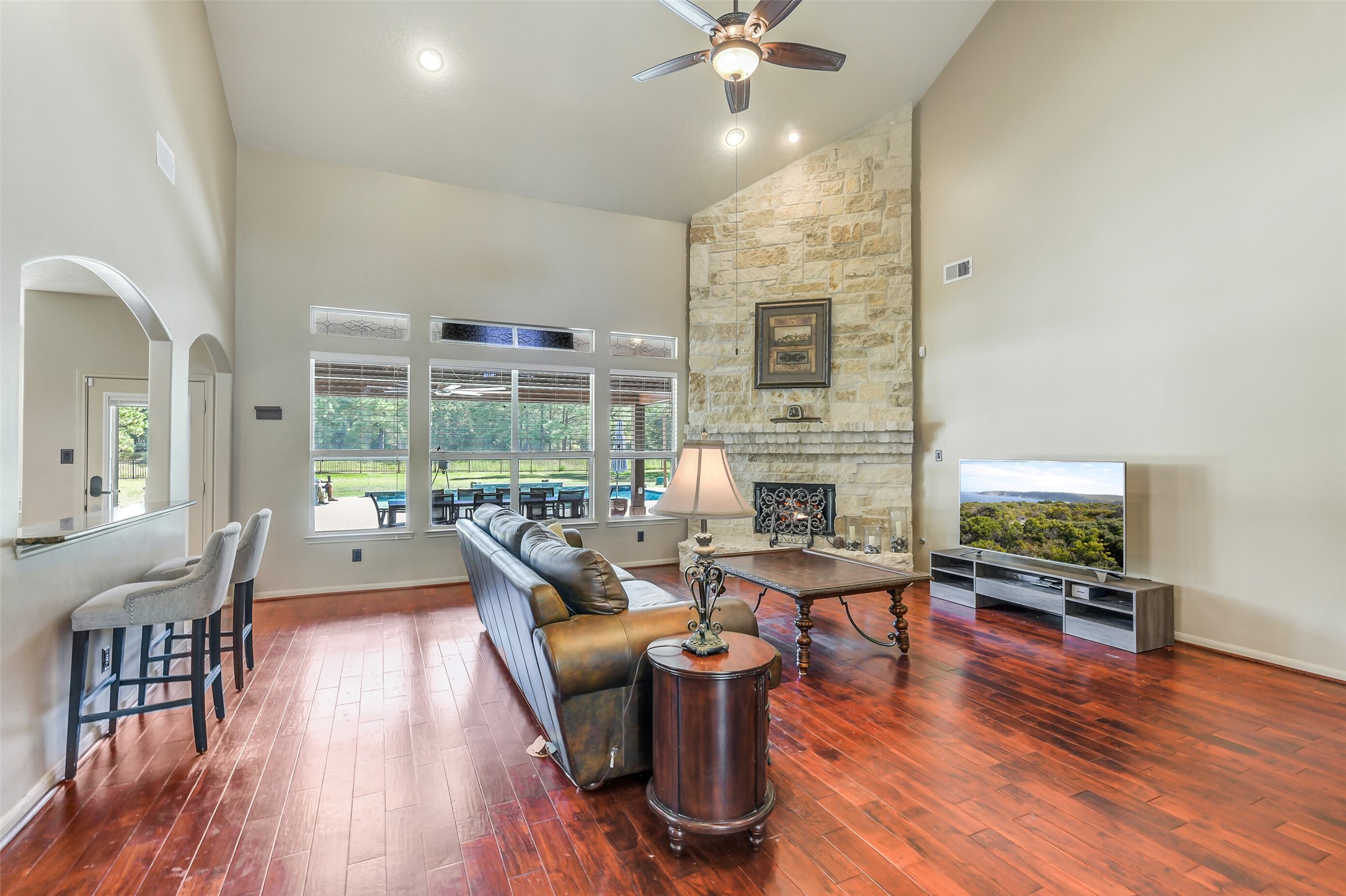 32711 Tall Oaks Way Magnolia, TX 77354 - Photo 6 of 50 a living room with furniture fireplace and wooden floor